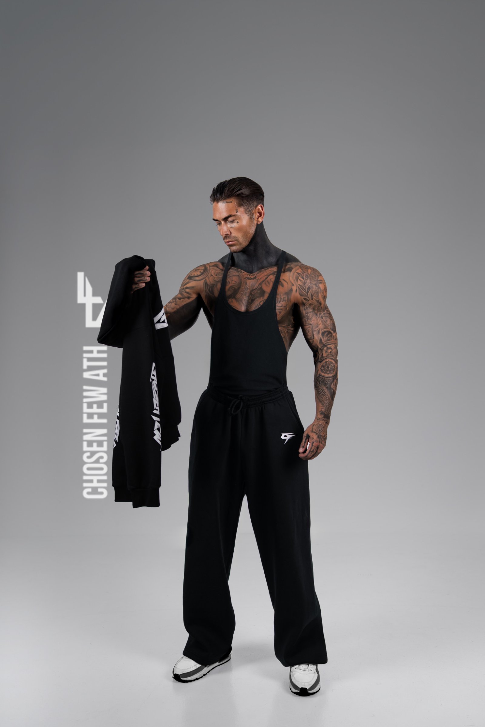 Chosen Few Athletics — Obsidian Black, full length, hoodie in hand